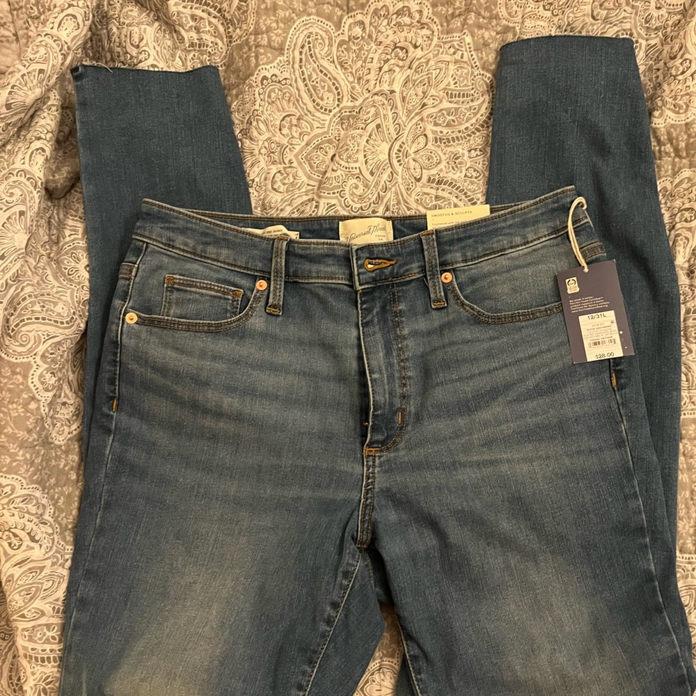 NWT fringe hem jeans